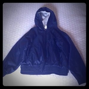 A navy blue rain coat